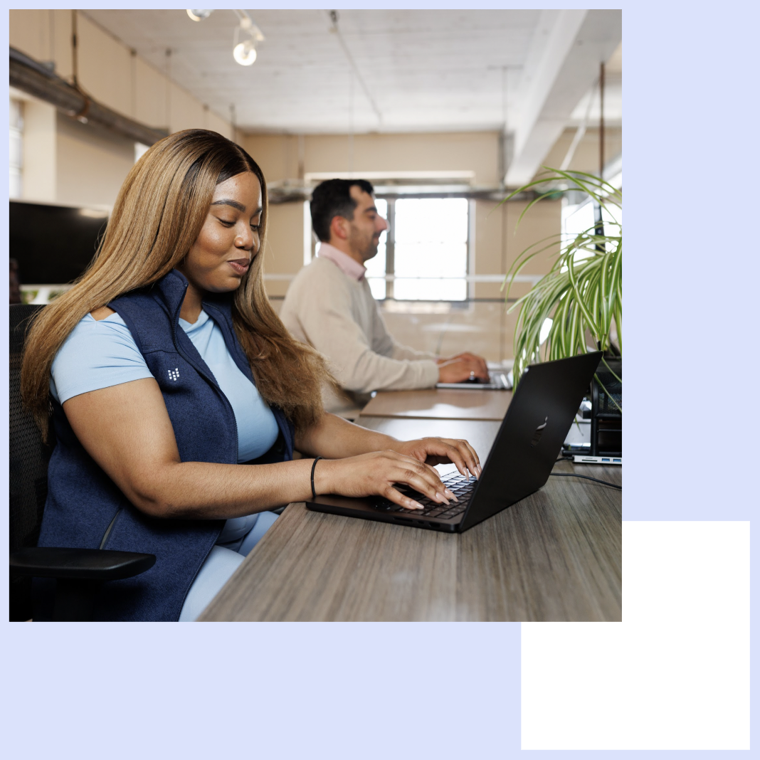 Woman typing on a laptop